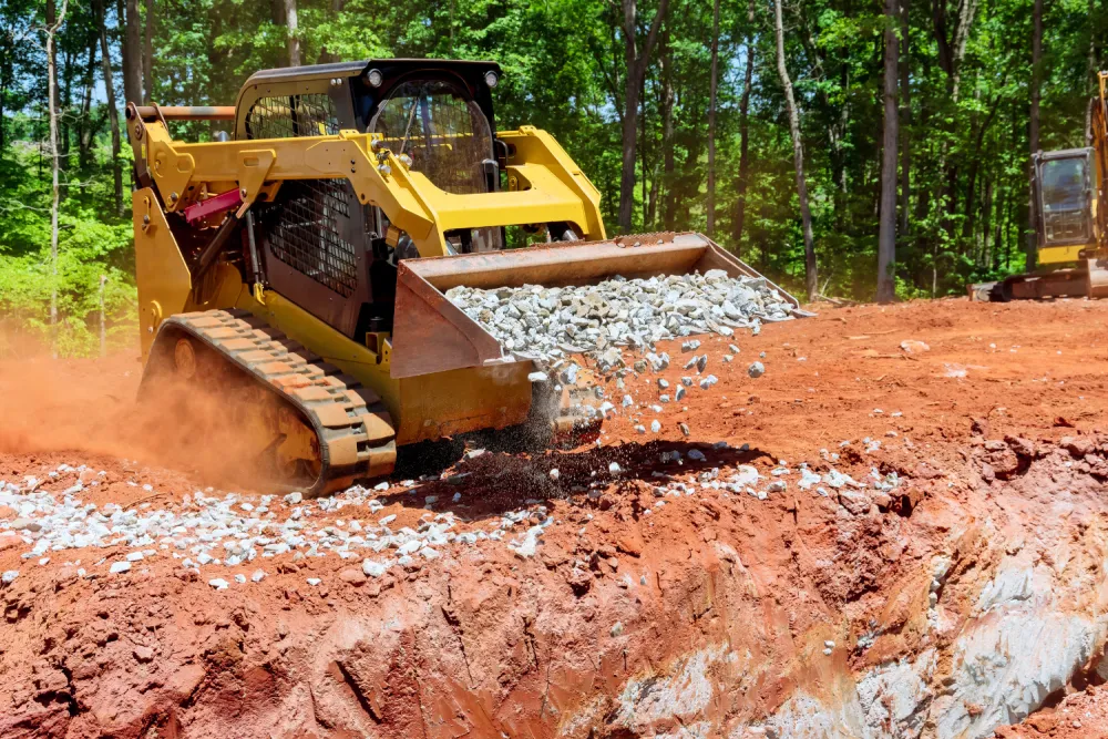 Graded ground after site work on a Montgomery County site